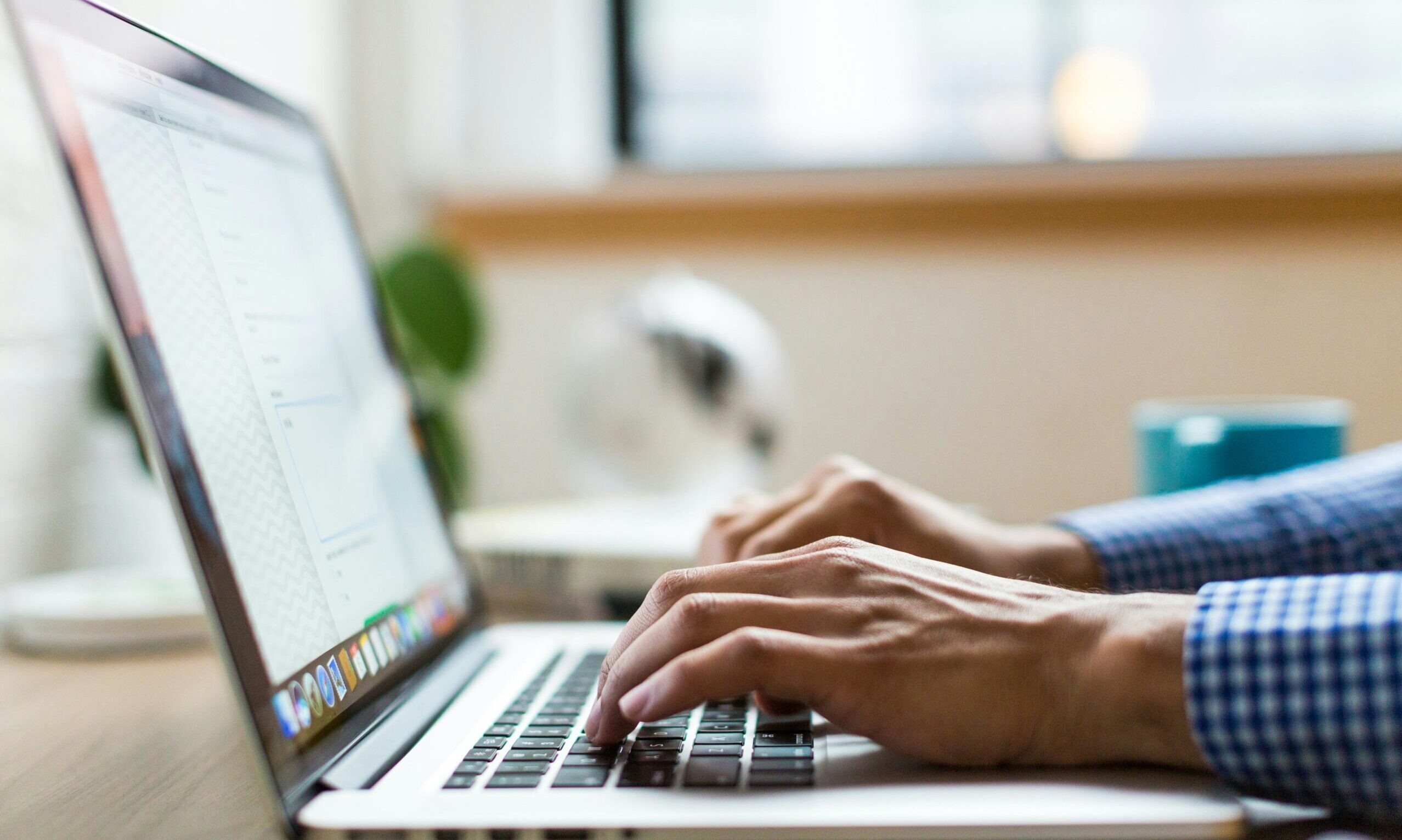 Is-Your-Business-Losing-Money-Because-Employees-Cant-Use-Tech-scaled.jpg person typing on silver Macbook